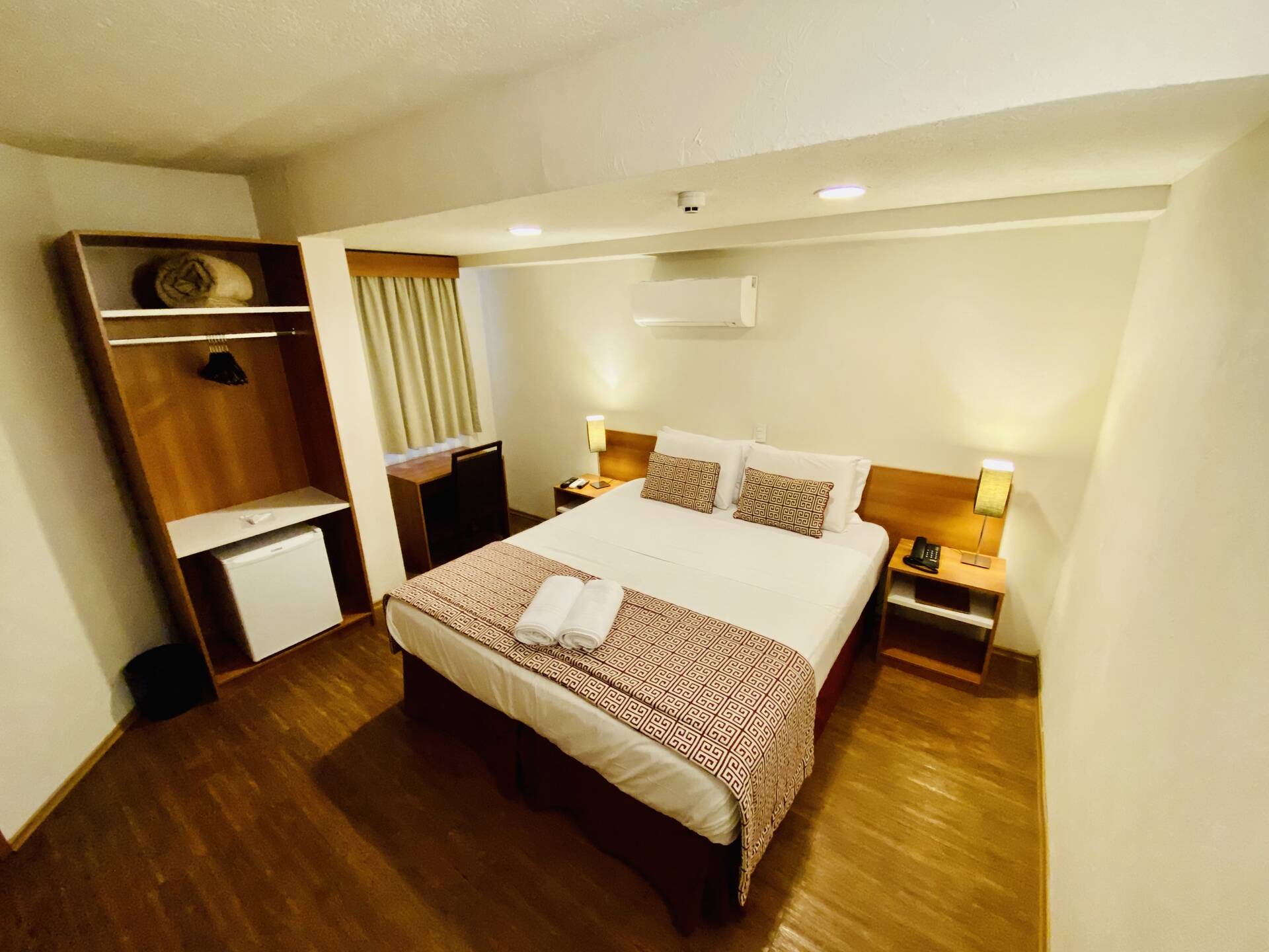 quarto de casal Lummina Hotel em Barueri